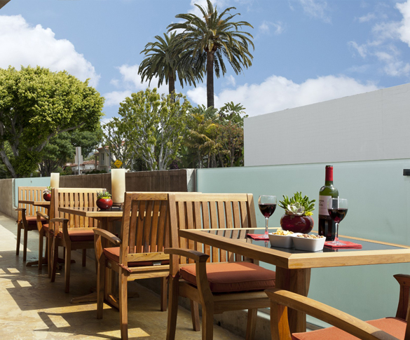 teak patio furniture at Hotel Elan in Los Angeles